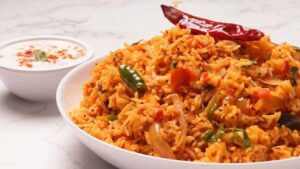 Tomato Rice Recipe: మధ్యాహ్న భోజనం ప్లేస్‌లో టొమాటో రైస్‌ ప్రయత్నించండి.. ఇలా సింపుల్‌గా రెడీ..